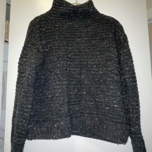 Madewell black and white speckled wool mock neck sweater.